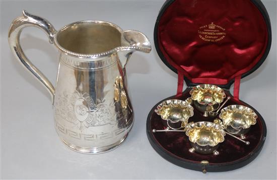 A cased set of late Victorian silver salts and a plated jug.